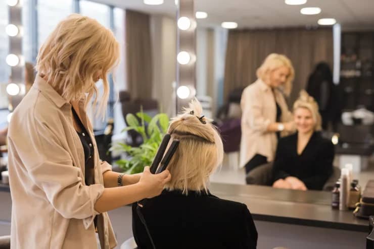 blonde-girl-getting-her-hair-done